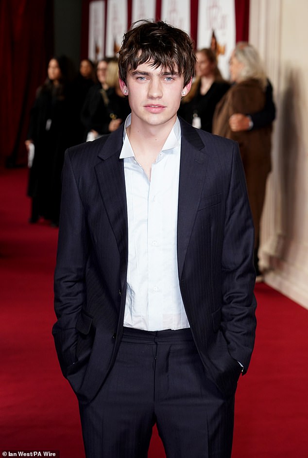 Actor Spike Fearn, who plays Casey in the movie, opted for a classic navy suit