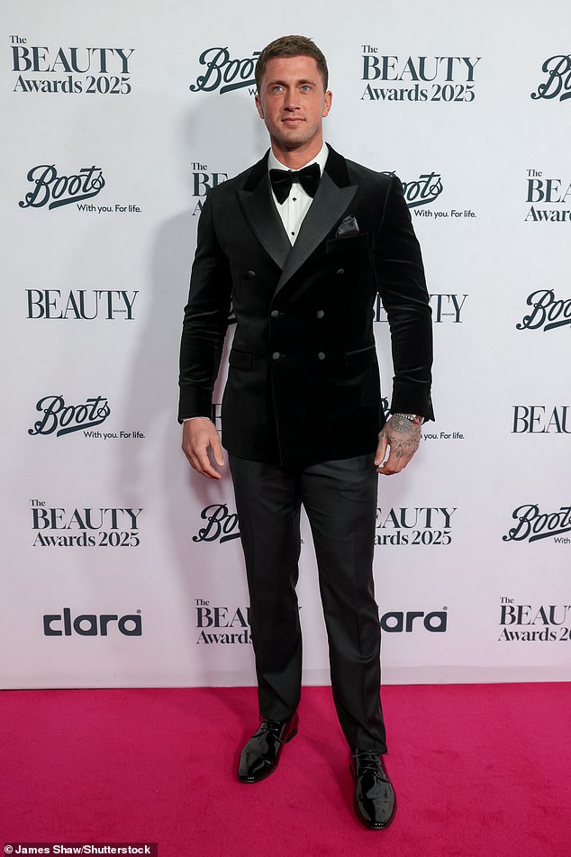 Dan Osbourne cut a dapper figure in a black suit