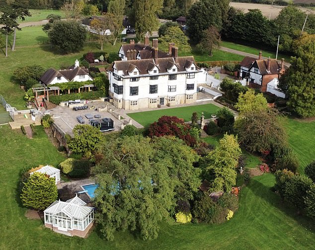 Andy Carroll and Billi Mucklow 's home has hit the market for £8million - after a sale for a much higher price fell through