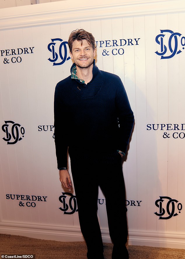 Jim Chapman looked dapper in a navy knitted top and trousers