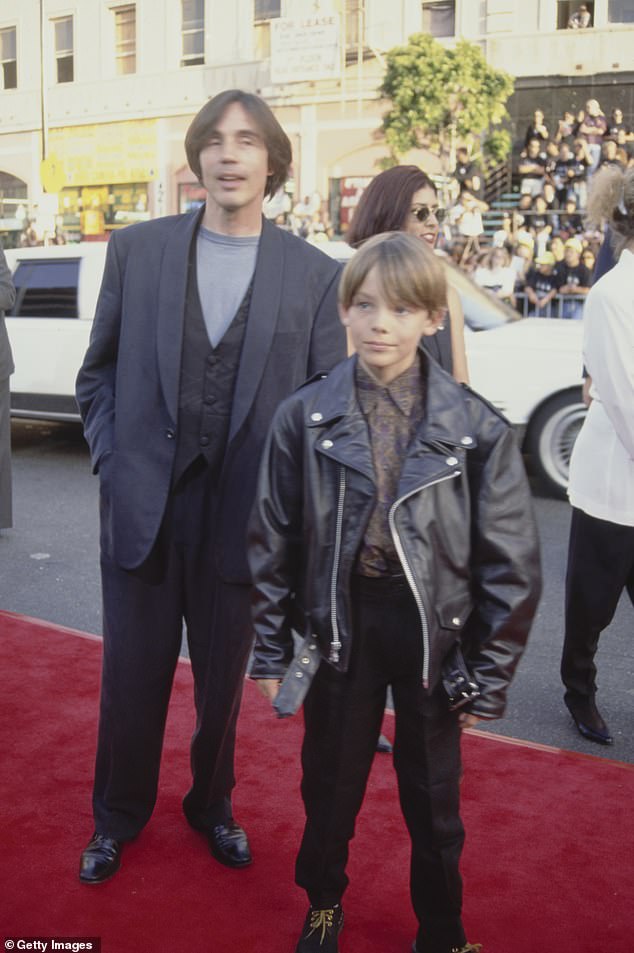 Ethan and his famous father at the premiere of Batman Returns in 1992