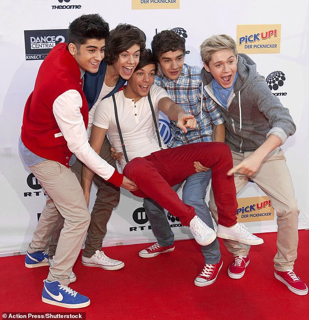 The song was the debut single, however 13 years later, he said he 'couldn't stand' stand the track which went to number one and gave them their first glimpse of stardom (pictured in 2011)