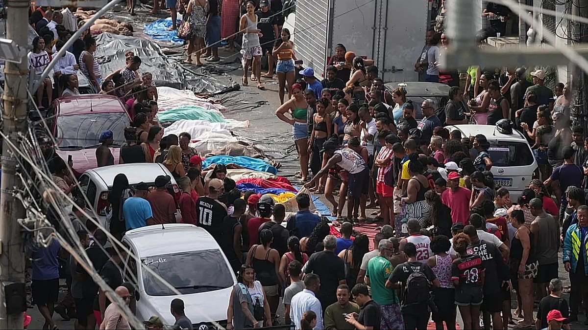 Angry families begin burying dead after police raid on Rio favela kills at least 132