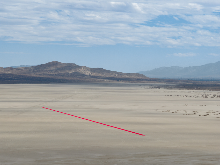 one-kilometer red line land art installation by gregory orekhov spans across california desert