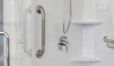 A metal wall bar can help a person reduce falls and maintain balance when entering or leaving a shower stall.