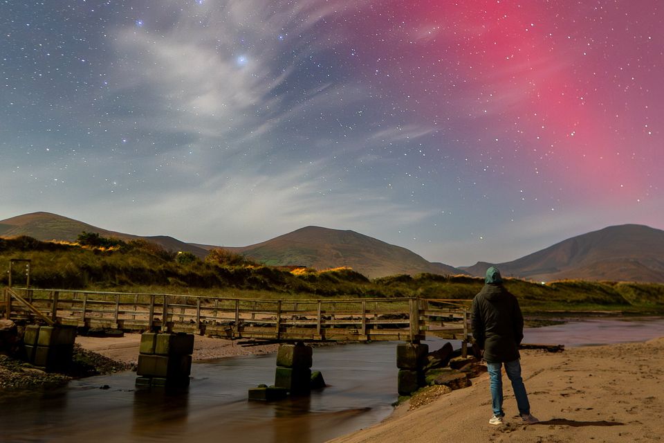 Tralee photographer Mark O'Sullivan pictured surveying the Northern Lights at Shore Acre Beach in Kerry at 5.30am on Wednesday morning. Photo by Mark O'Sullivan.