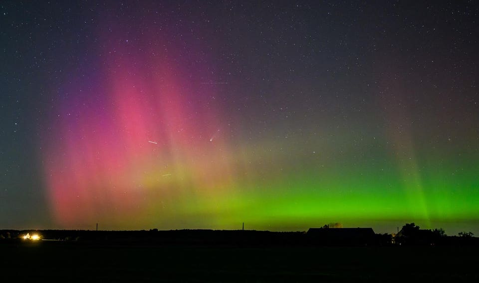 Aurora borealis and comet light up the night sky