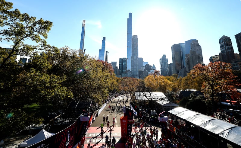 Competitors cross the finish line during the New York City Marathon on November 2. Photograph: Ishika Samant/Getty