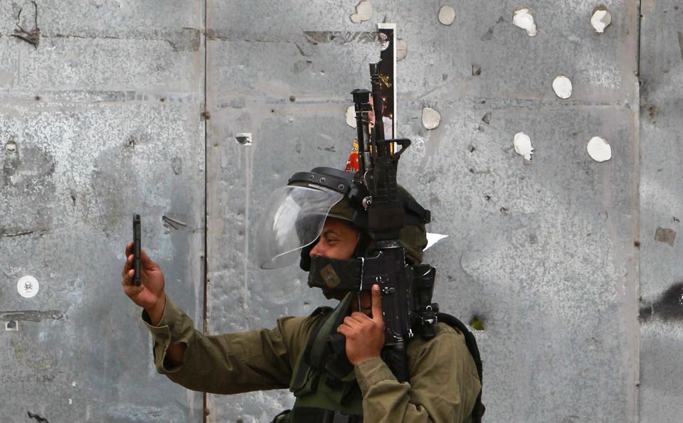 IDF soldier using phone
