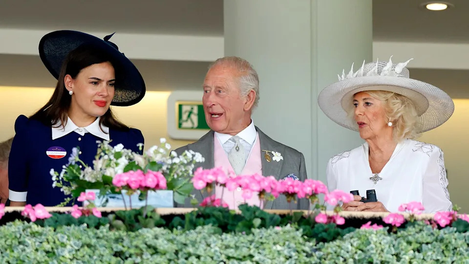 King Charles and Queen Camilla chatting with a concerned Sophie Winkleman.