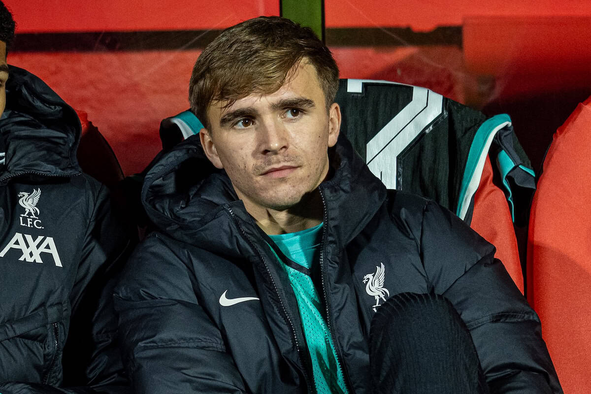 GIRONA, SPAIN - Tuesday, December 10, 2024: Liverpool's Jarell Quansah (L) and James Norris on the bench before the UEFA Champions League game between Girona FC and Liverpool FC at the Estadi Montilivi. Liverpool won 1-0. (Photo by David Rawcliffe/Propaganda)