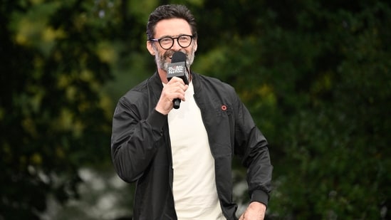 Amidst the holiday season, Hugh Jackman is trying to balance his new relationship (Photo by Evan Agostini/Invision/AP)(Evan Agostini/Invision/AP)