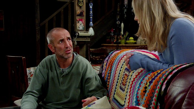 Sam speaks to Belle at Wishing Well in Emmerdale