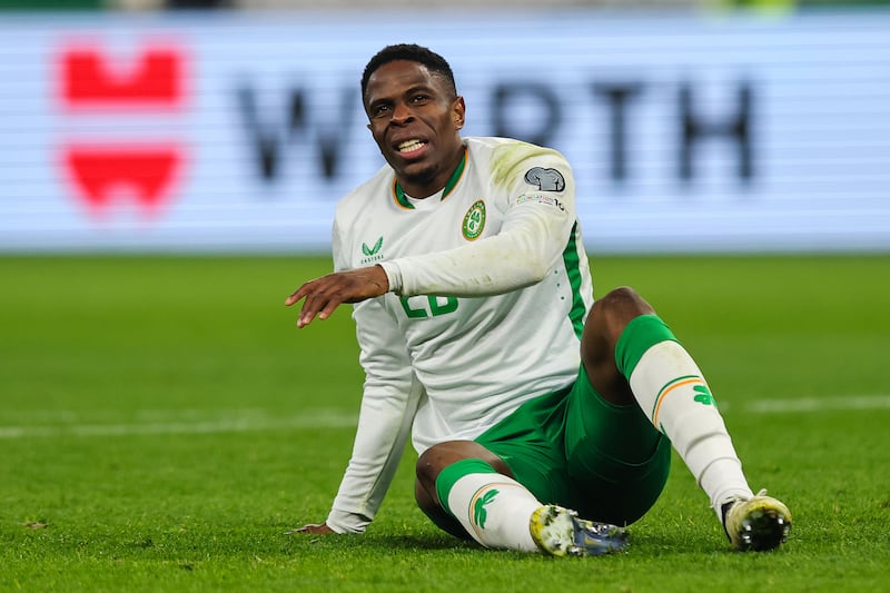 Ireland's Chiedozie Ogbene is injured during the match against Hungary. Photograph: Ryan Byrne/Inpho