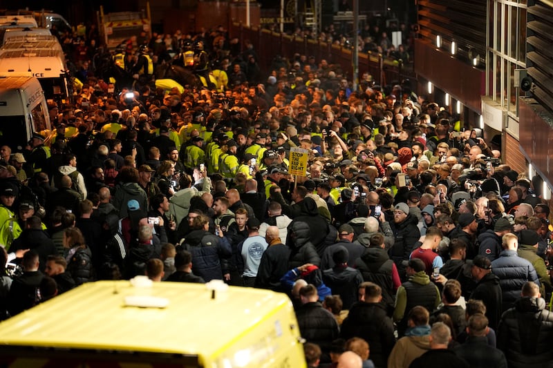 Police among fans outside the ground before at Villa Park last night. Photograph: Martin Rickett/PA Wire