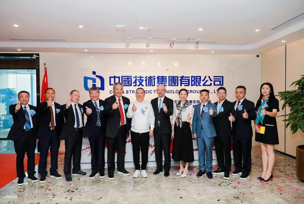 Uspace Technology Group executives last month marked the relocation of its headquarters from Hong Kong to Guangzhou. Photo: Handout