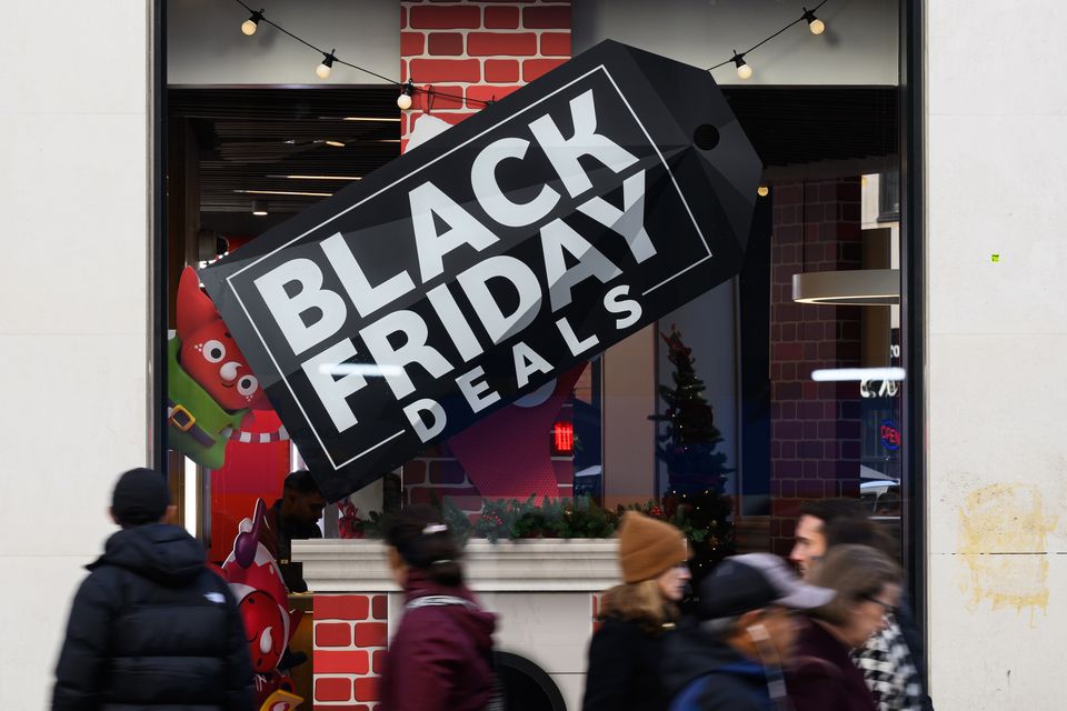 Sales marketing circus: Many high street retailers started their Black Friday sales early. Photo: Leon Neal/Getty 
