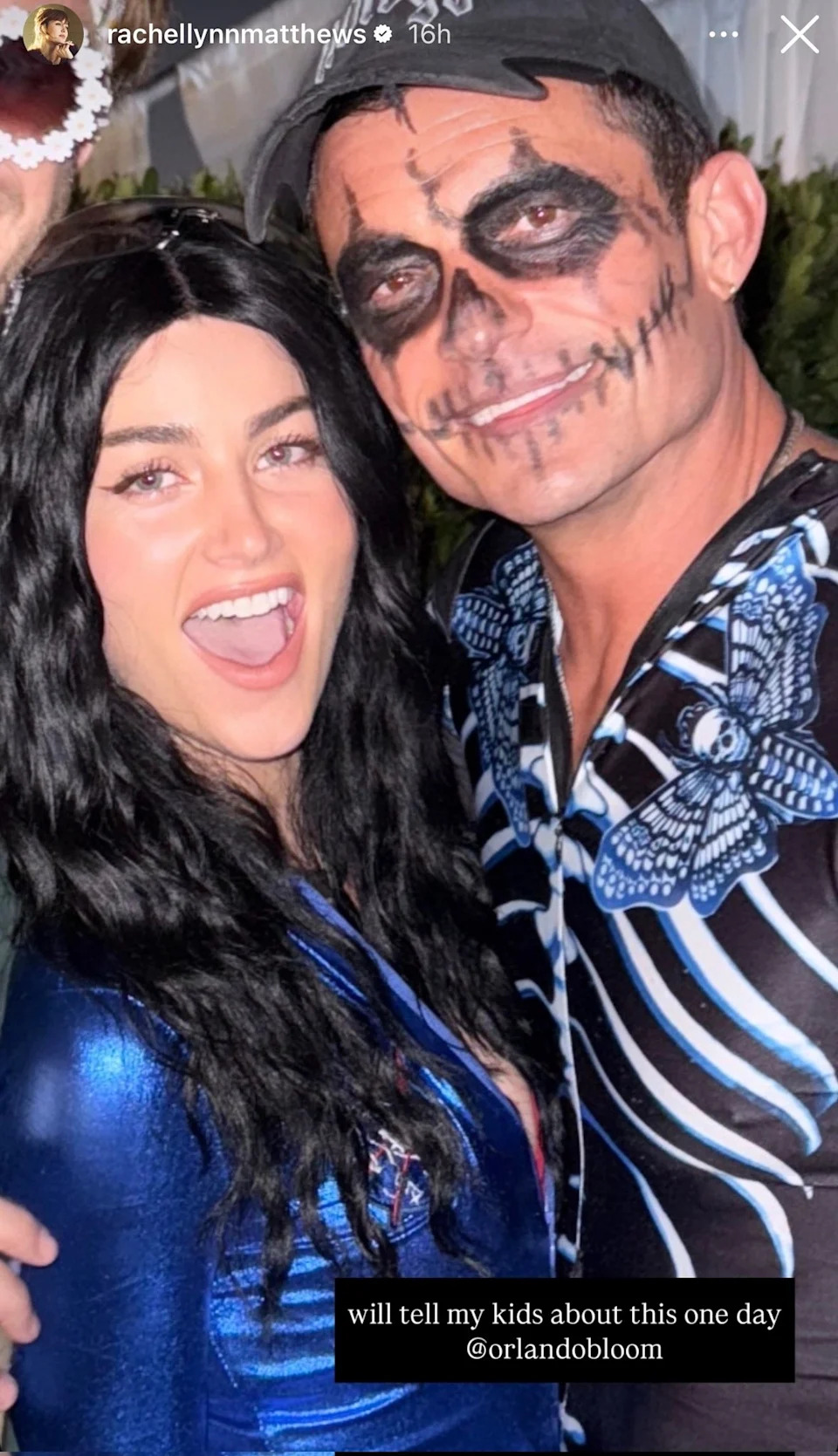 Two people in Halloween costumes; one in a skeleton-themed outfit with face paint, and the other in a shiny outfit with long, dark hair