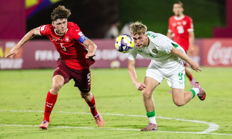Ireland’s Michael Noonan in action against Switzerland's Gil Zufferey. Photograph: Inpho