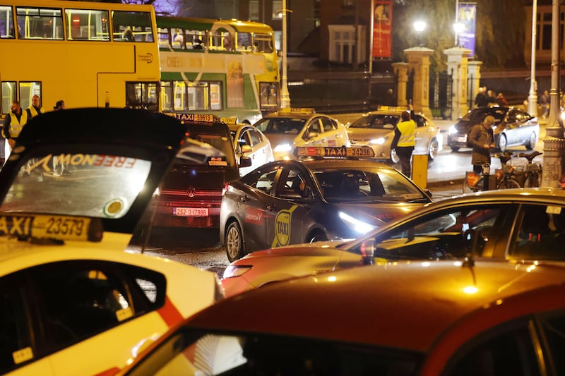 Dublin taxi drivers protesting against Uber's fixed fare system in the city centre. Photograph: Alan Betson

