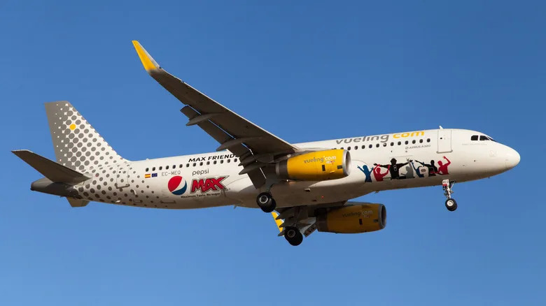 a Vueling airplane with Pepsi Max branding on it