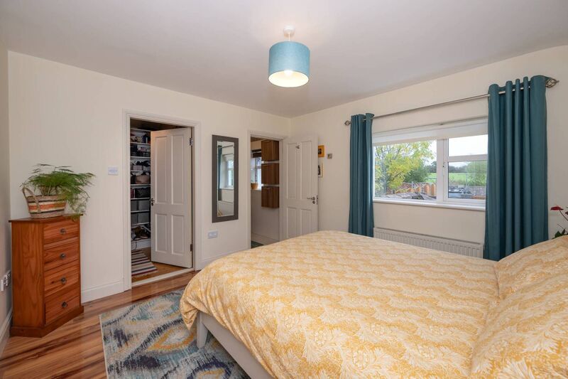 En suite bedroom with walk-in wardrobe