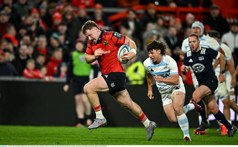 Sean O'Brienbreaks away from Estanislao Pregot of Argentina XV on his way to scoring his side's fifth try. Pic: Sam Barnes/Sportsfile