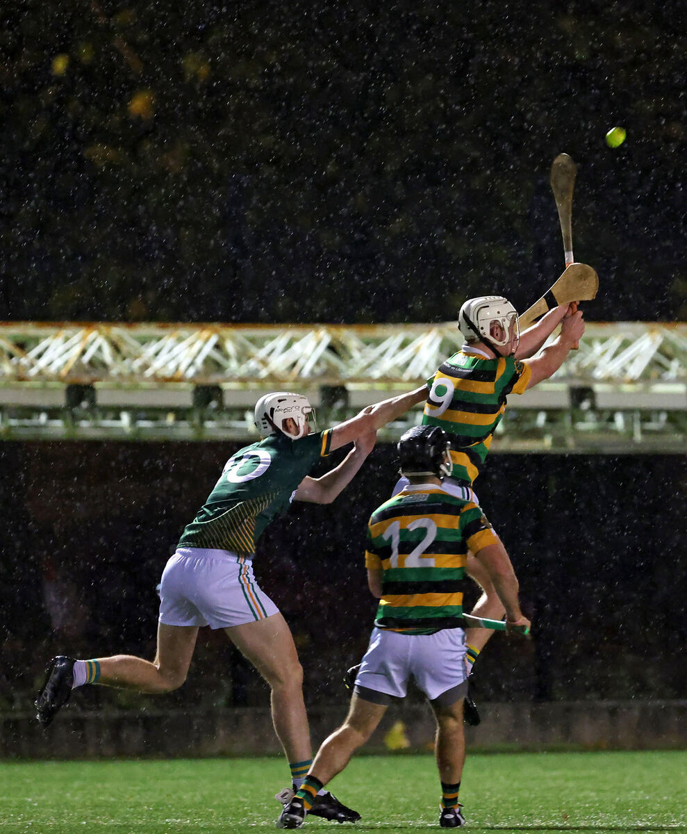  Shane O'Shaughnessy, Blackrock, contests the dropping ball with Rhys Dunne and Fiachra O'Driscoll, Glen Rovers. Picture: Jim Coughlan.
