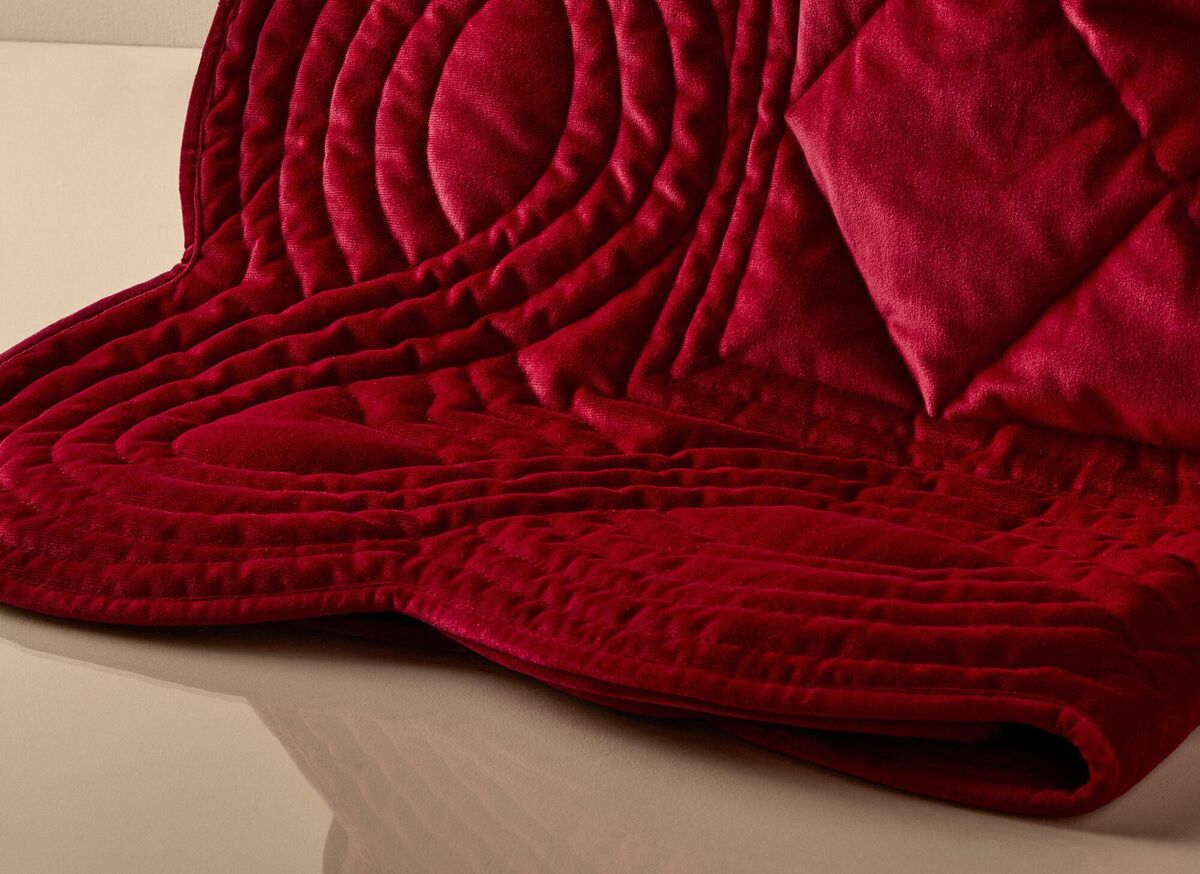  Red is synonymous with the festive season and something practical like a throw will add a sense of occasion; €55, Penneys.
