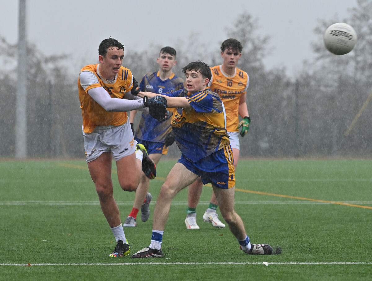  Shane O'Loughlin, Presentation Secondary School, Milltown, puts pressure on Donnacha O'Mahony, Hamilton High School, Bandon. Picture@ Dan Linehan