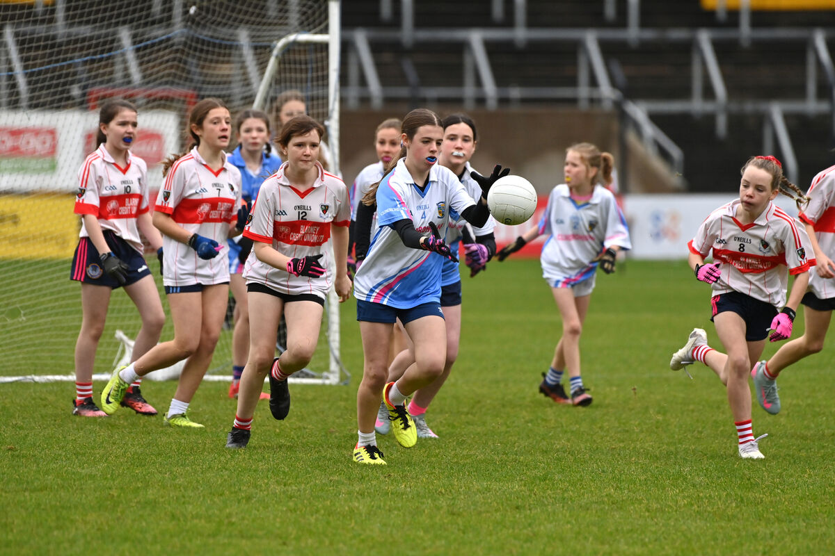  Emma Bradley, Clondrohid breaking past Ellie Mai O'Connor, Blarney during the Sciath na Scol Championship DGF7 football finals at Páirc Uí Chaoimh. Picture Dan Linehan