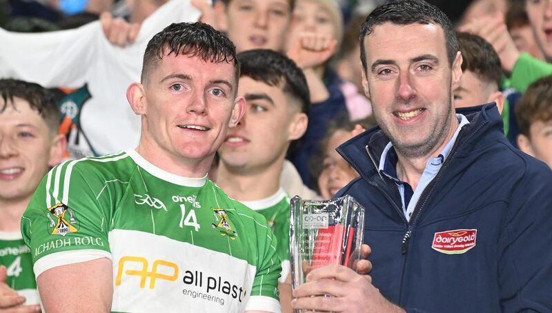  MATCH WINNER, AGAIN: Fintan McSweeney Co Op Superstores presents the 'man of the match'award to Aghabullogue's Matthew Bradley. Pic: Eddie O'Hare