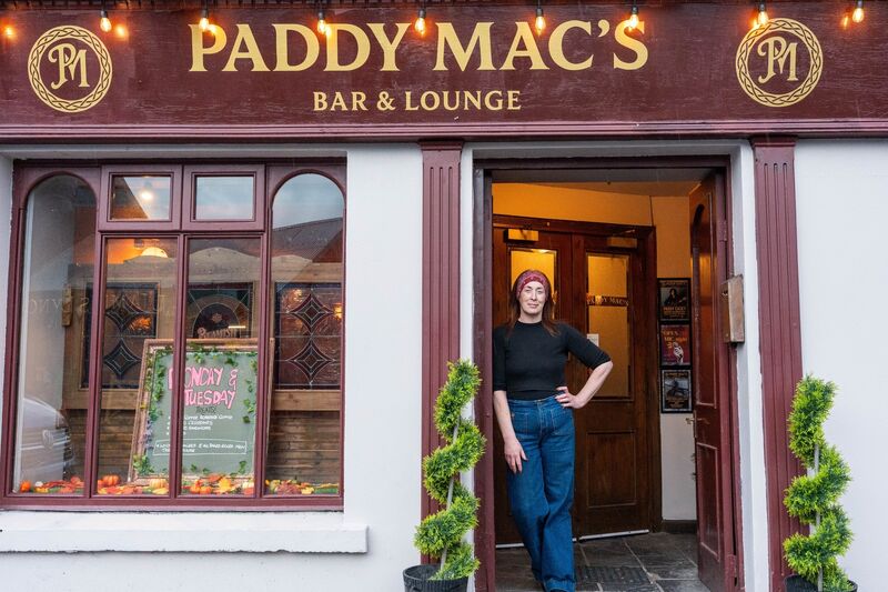 Aileen outside Paddy Mac’s in Coachford. The building has a long history and was originally a hotel.	 Picture: Noel Sweeney
                    