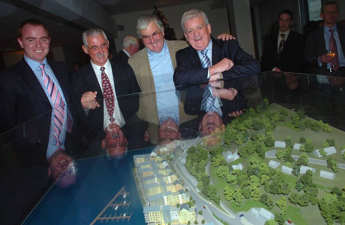 (left) Jason Clerkin, Managing Director, Howard Holdings, and (right) the late Greg Coughlan, Chief Executive, Howard Holdings show the proposed Passage West development to Brian Cox, Aer Lingus and former Passage dockyard site owner Landy Hill at the Howard Holdings Christmas Lunch at The Clarion Hotel, Cork on Wednesday 19th December 2007. Picture; Larry Cummins