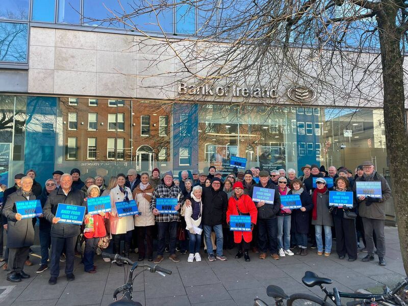 Bank of Ireland retirees protesting outside the bank's South Mall branch in Cork City amid calls to revisit crisis-era pension cutbacks 