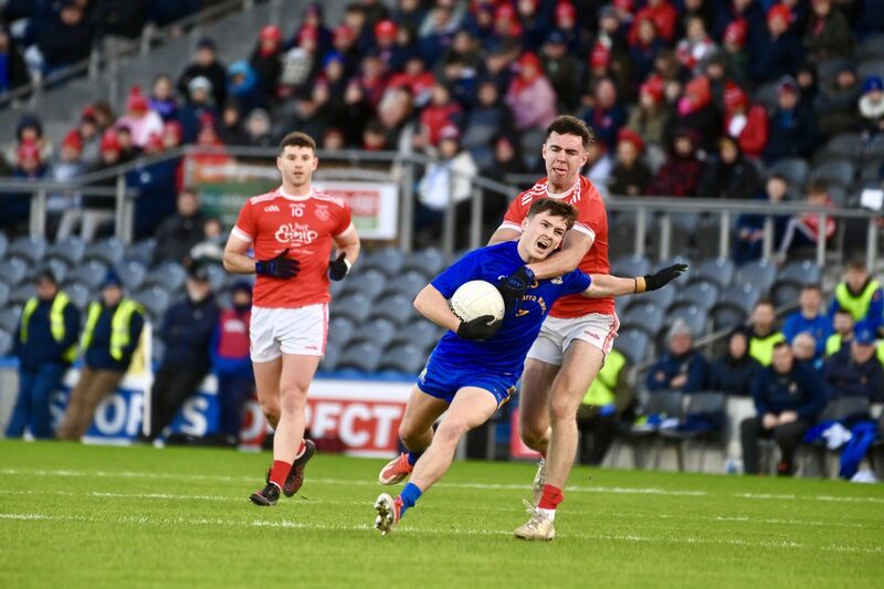  John Wigginton-Barrett wins a free for St Finbarr’s against Éire Óg, Ennis. Picture: Larry Cummins