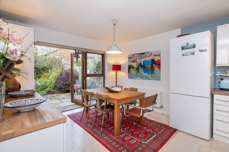 Teak double doors to sun-trap patio