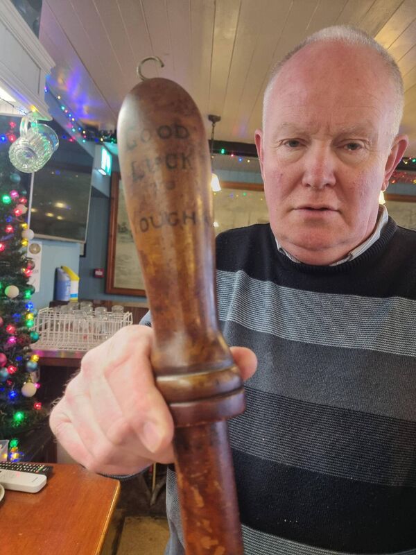 Kevin Linehan with a belaying pin from the Pequod from 'Moby Dick' at the bar named in honour of the film in Youghal, Co Cork. Picture: Christy Parker