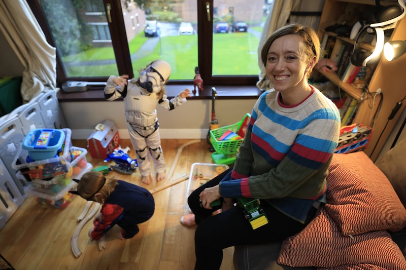 Ashley Steed with her children Caolin (4) and Ruairí (2) and some of their pre-loved toys.  Photograph: Nick Bradshaw