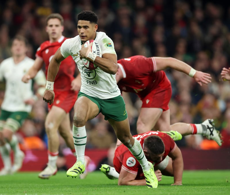 Sacha Feinberg-Mngomezulu breaks clear to score South Africa's sixth try during the match against Wales at the Principality Stadium. Photograph: David Rogers/Getty Images