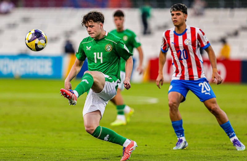 Ireland’s Gavin McAteer in action against Paraguay's Pedro Villalba. Photograph: Inpho