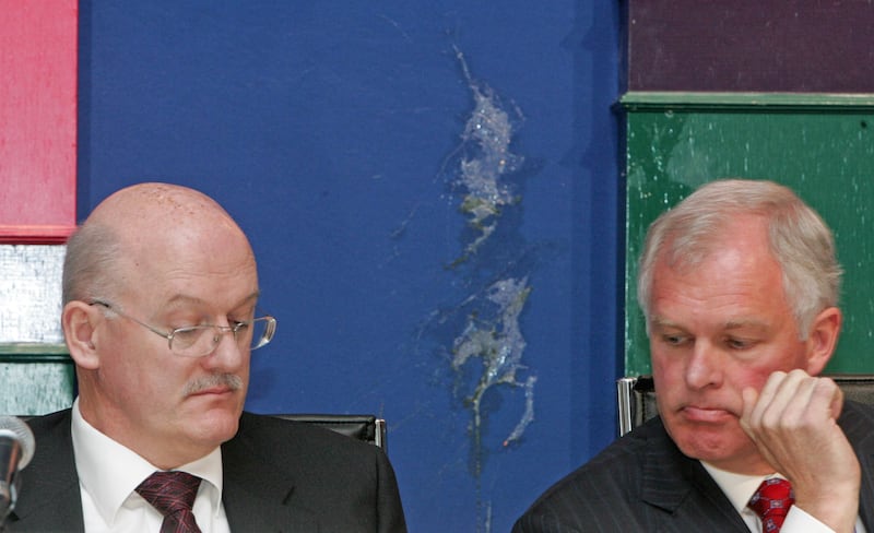 Egg stains on the panel behind AIB finance director John O'Donnell and chief executive Eugene Sheehy at the AIB egm in Ballsbridge in May 2009. Photograph: Frank Miller