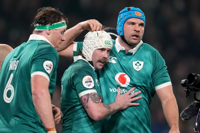 Mack Hansen is congratulated by teammates after scoring Ireland's first try of the game against Australia at the Aviva Stadium on Saturday. Photograph: Brian Lawless/PA Wire