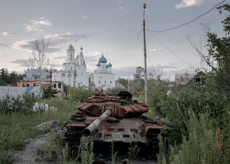 An abandoned Russian tank which was destroyed by Ukrainian forces during a battle to retake the town of Sviatohirsk in July 2023. Photograph: Emile Ducke/The New York Times
                      