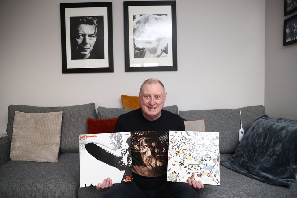 Colin Doonan from East Belfast, holds his Led Zeppelin albums, Colin was at a Led Zeppelin concert in 1971 and caught a harmonica from the band and sold it the next day for £5. Picture by Peter Morrison