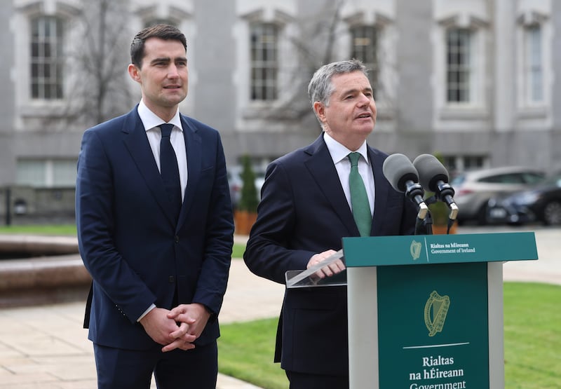 Minister for Public Expenditure Jack Chambers (left) with Paschal Donohoe outside Government Buildings on Tuesday. Photograph: Damien Eagers/PA Wire