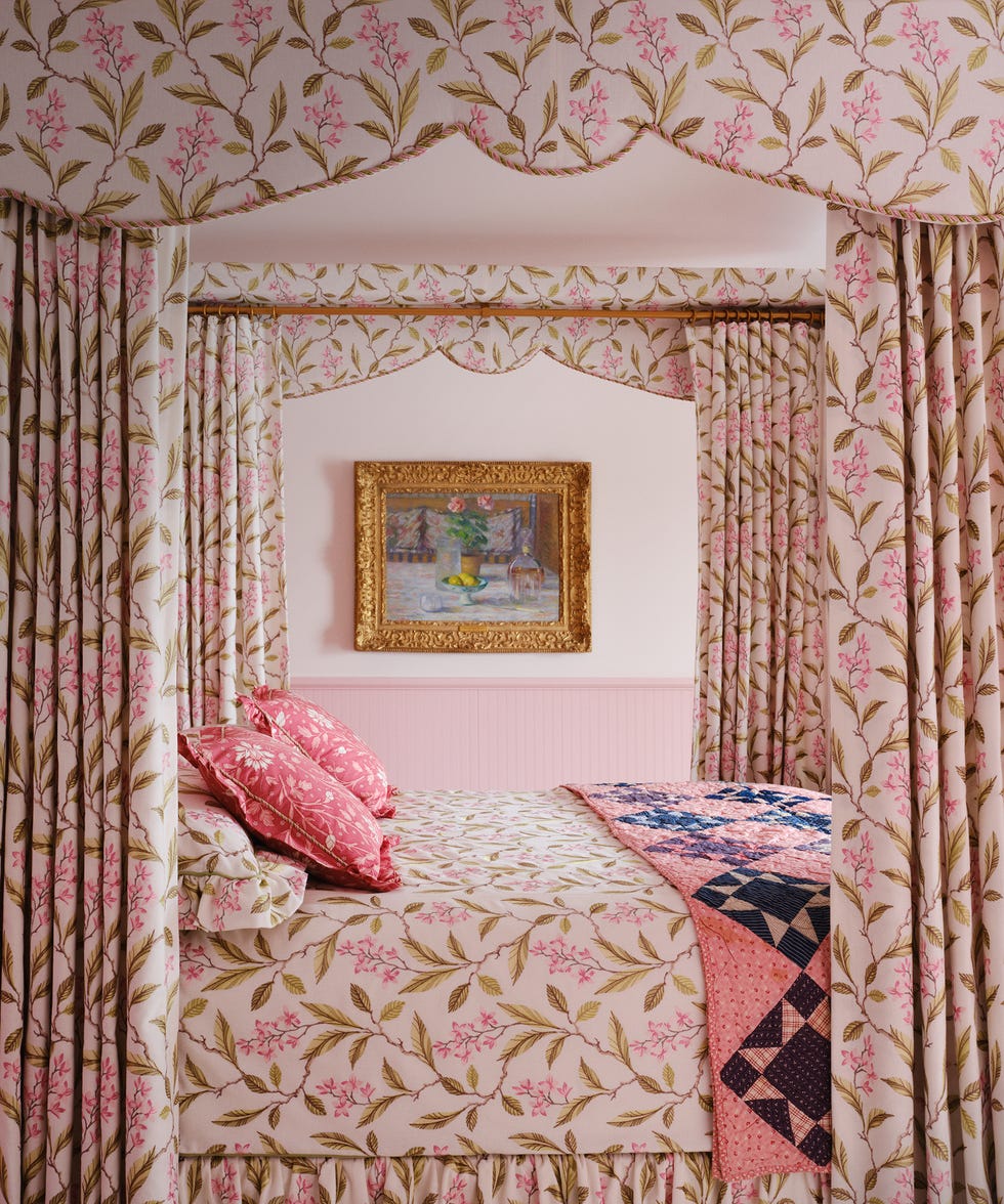 Bedroom with floral theme and artwork