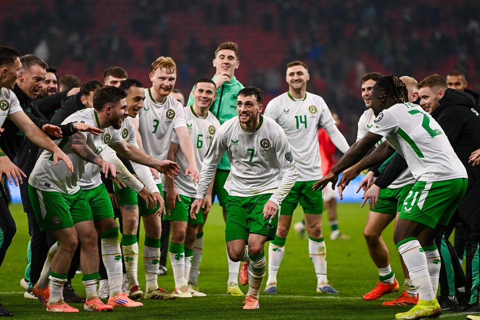 Ireland players, including Troy Parrott, centre, celebrate after Hungary win