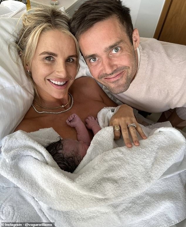 Vogue and Spencer pictured with their son Otto shortly after his birth in May 2023
