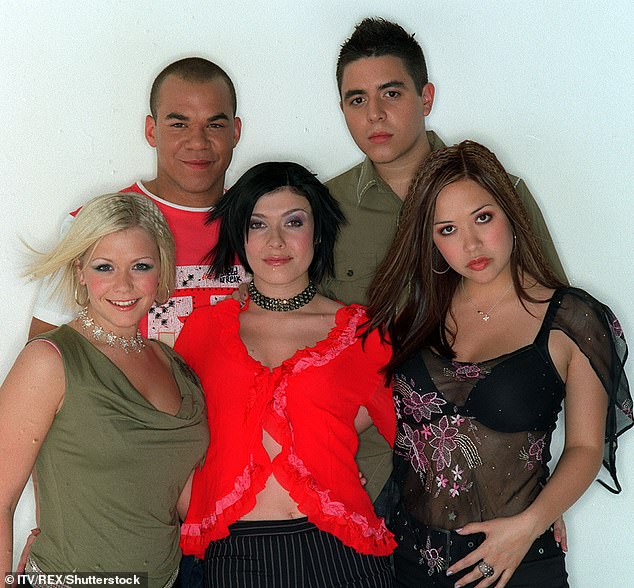 Noughties reality show Popstars has gone viral two decades on as fans reflect on the 'unhinged' moments that aired (pictured: Hear'Say's Suzanne Shaw, Danny Foster, Kym Marsh, Noel Sullivan and Myleene Klass)